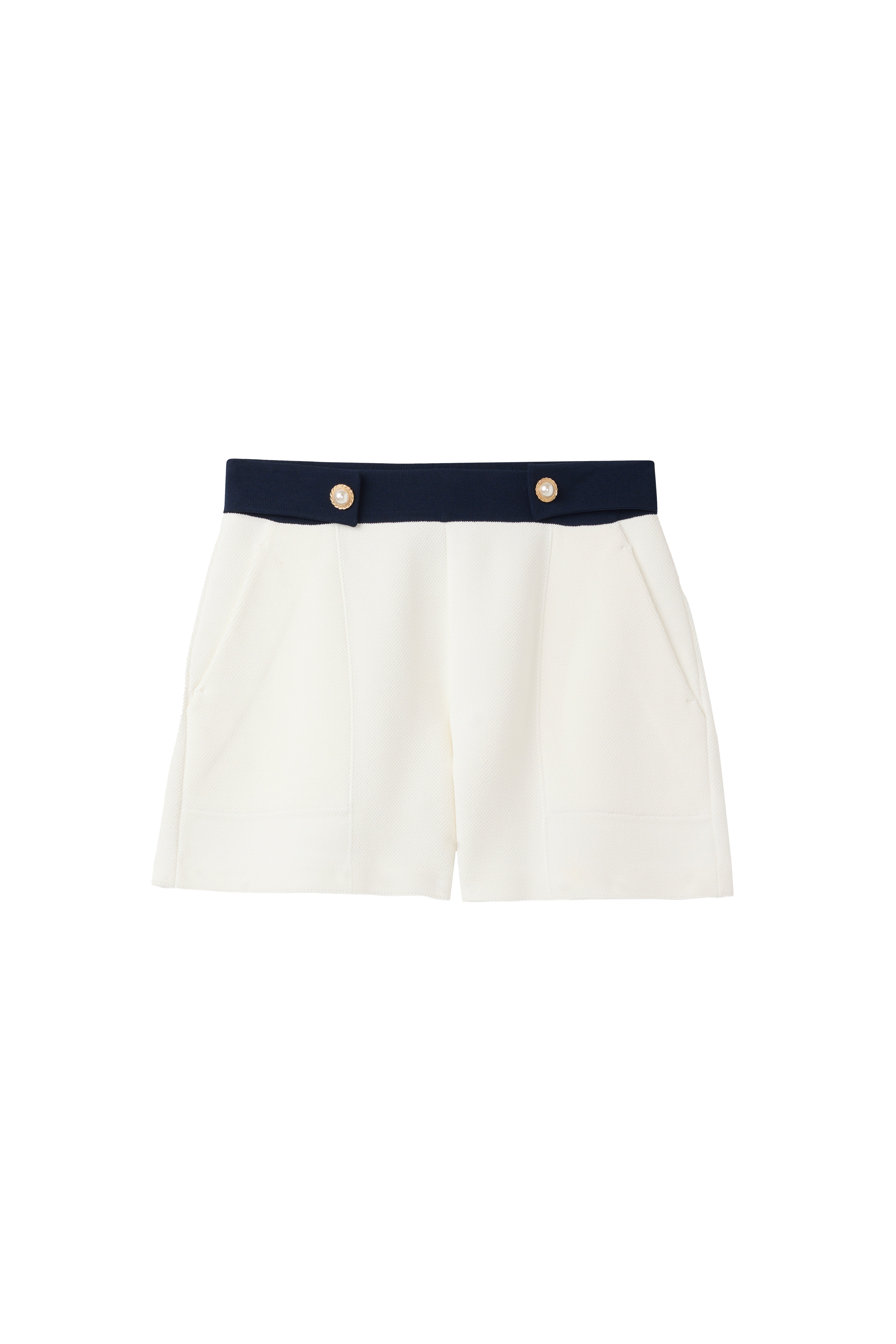 White St John Knits Malbon shorts with a navy waistband on a white background